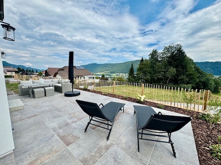 Terrace/patio. Holiday Home 'Steinrose' with Lake View, Private Terrace and Wi-Fi