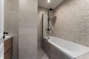 Shower, towels, soap, shampoo