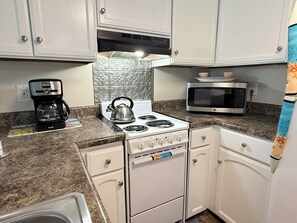 Fridge, microwave, dishwasher, coffee/tea maker