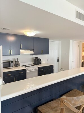 Fridge, microwave, dishwasher, coffee/tea maker