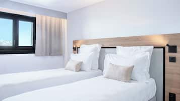 Premium-huoneisto | Ylelliset vuodevaatteet, tallelokero huoneessa