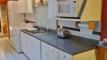 Cottage, 4 Bedrooms | Private kitchen | Fridge, coffee/tea maker, toaster