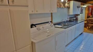 Cottage, 4 Bedrooms | Private kitchen | Fridge, coffee/tea maker, toaster
