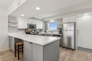 Condo, 2 Bedrooms | Private kitchen | Fridge, oven, coffee/tea maker