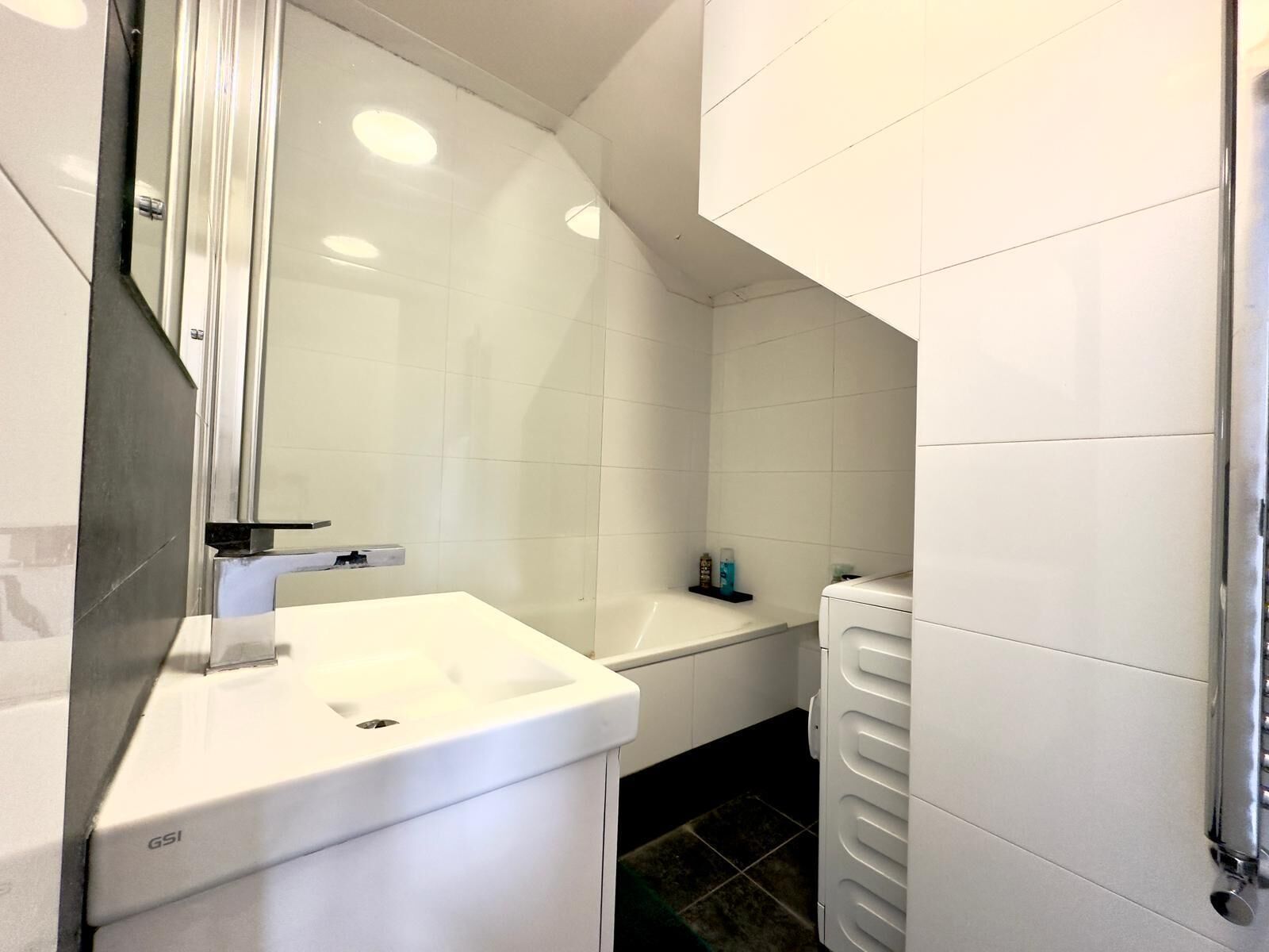 Bidet, towels, soap, toilet paper