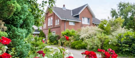 A house with a garden in front.
