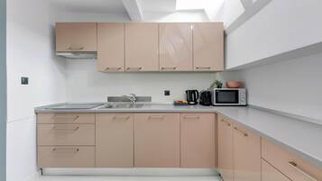 Cobertura família | Cozinha privada | Geladeira grande, micro-ondas, fogão, cooktop