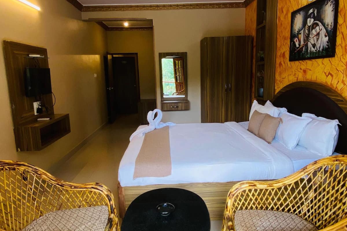 Comfort Suite, Balcony, Pool View | Desk, laptop workspace, iron/ironing board, free WiFi