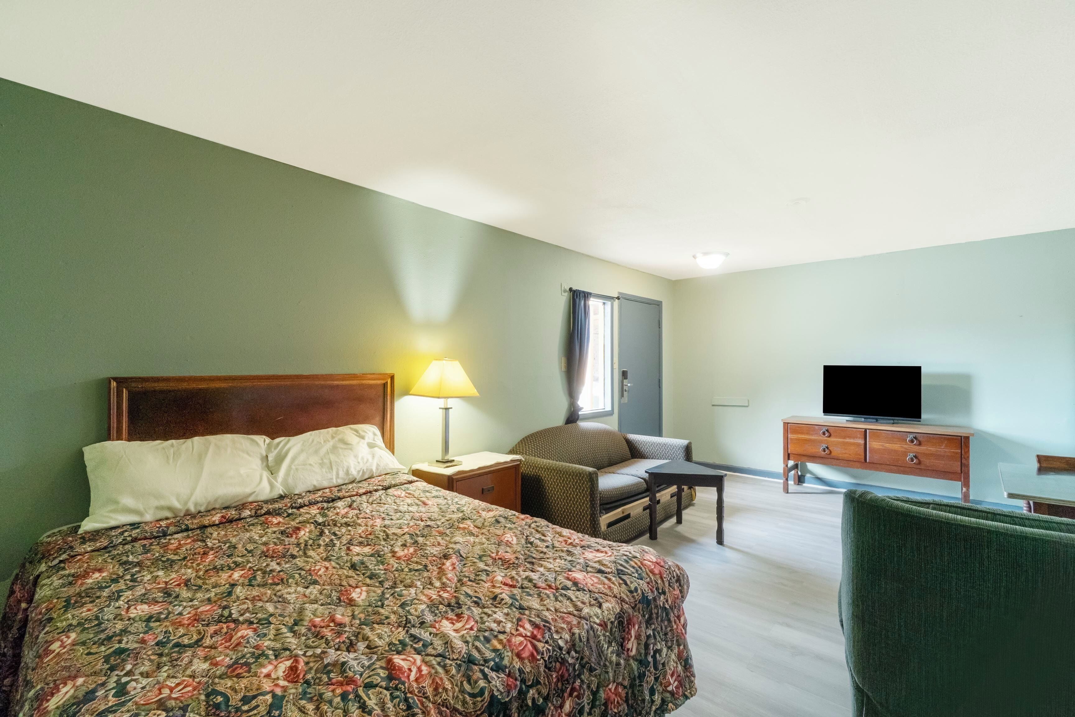 Room, 1 King Bed, Non Smoking, Kitchenette | Desk, iron/ironing board, bed sheets