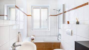 Shower, free toiletries, hair dryer, towels