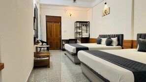 Deluxe Quadruple Room | Desk, laptop workspace, soundproofing, iron/ironing board - Hotel Insta 18 (Siliguri)