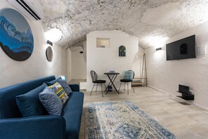 Apartment | Living area | 40-inch Smart TV with digital channels