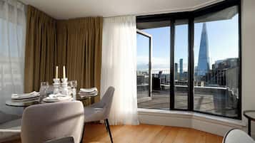 Luxury Penthouse, Balcony, City View | Living area | 42-inch Smart TV with digital channels