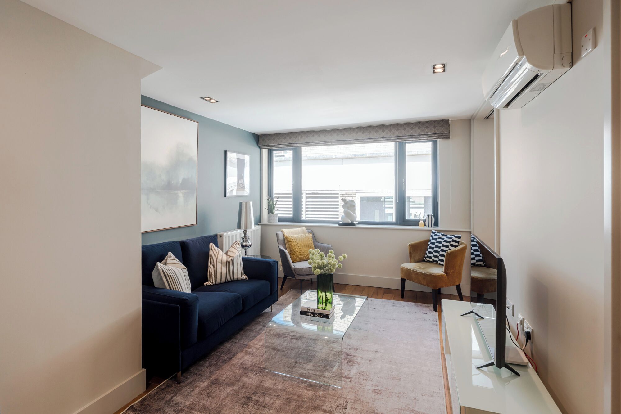 Design Apartment | Living area | 42-inch Smart TV with digital channels