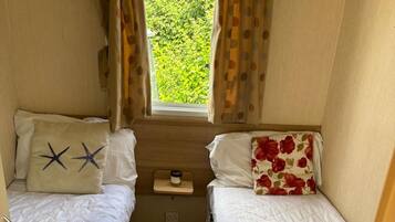 4 kamar tidur, setrika/meja setrika, Wi-Fi gratis, dan seprai linen