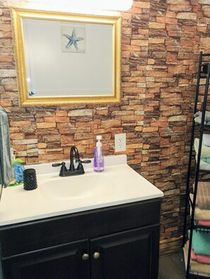 Hair dryer, towels, soap, shampoo