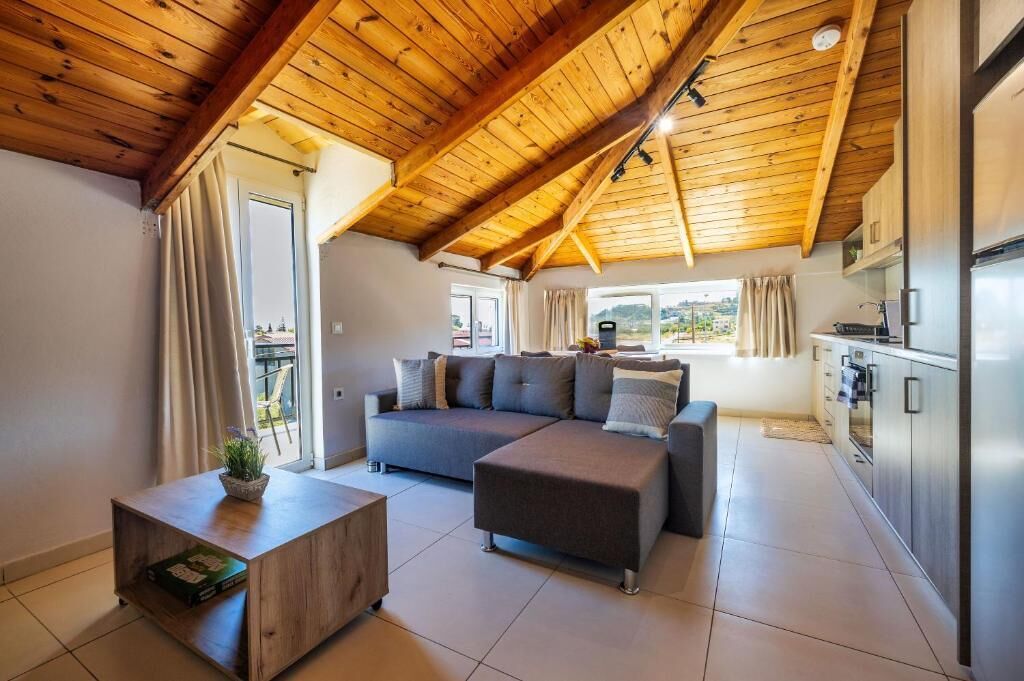 Classic Apartment, Balcony | Living area | Flat-screen TV