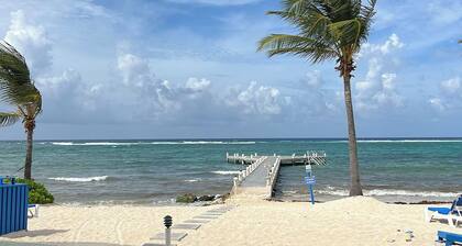 Step onto beach! Beach front 2 bed + bath condo with full kitchen, LR/DR, patio