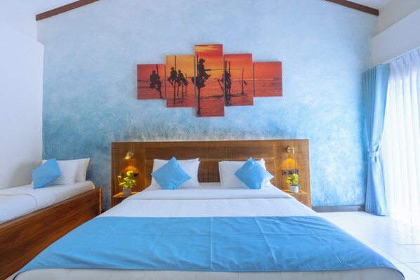 Deluxe Triple Room | In-room safe, free WiFi