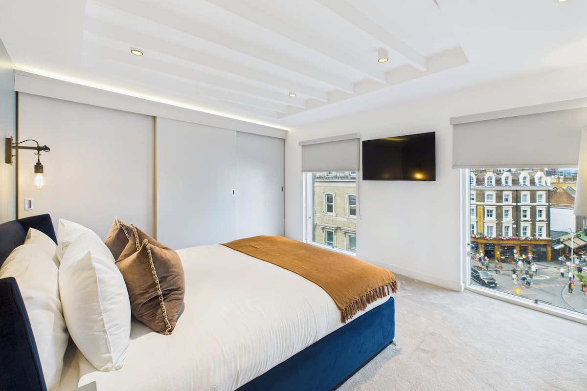 Apartament destacat, 2 dormitoris | Escriptori i espai de treball apte per a portàtils