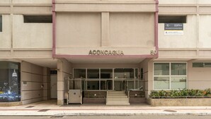 A building with the name 'Aconcagua' and the number '50' on the facade. - Beachfront apt BC Center Close to Attract. Aco803 (Balneário Camboriú)