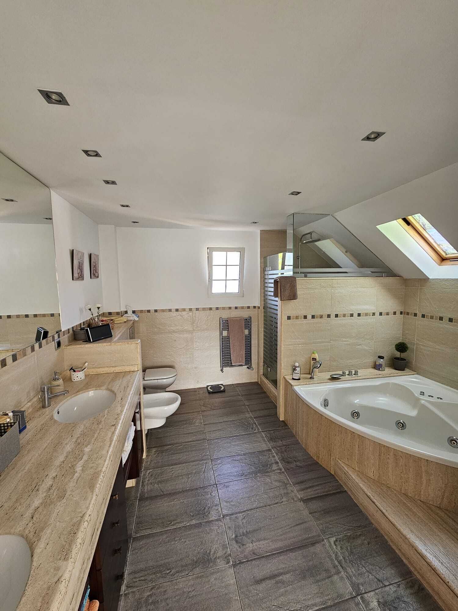 Shower, jetted tub, towels, soap