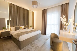 1 bedroom, desk, iron/ironing board, travel crib