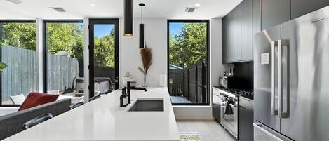 Microwave, stovetop, dishwasher, coffee/tea maker