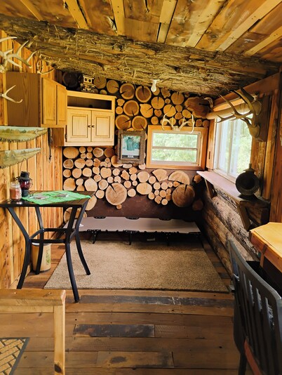 Hunting Cabin Rustic Handcrafted primitive sits in our unique rustic Cowboy Town