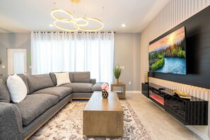 Téléviseur, lecteur de DVD, chaîne audio, bureau