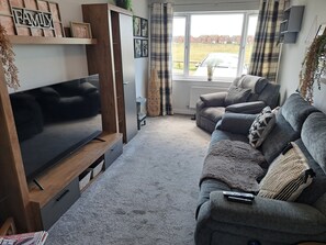 TV, fireplace - Redfern Retreat Beautiful home with stunning views of Lytham st annes sand dunes (Lytham)