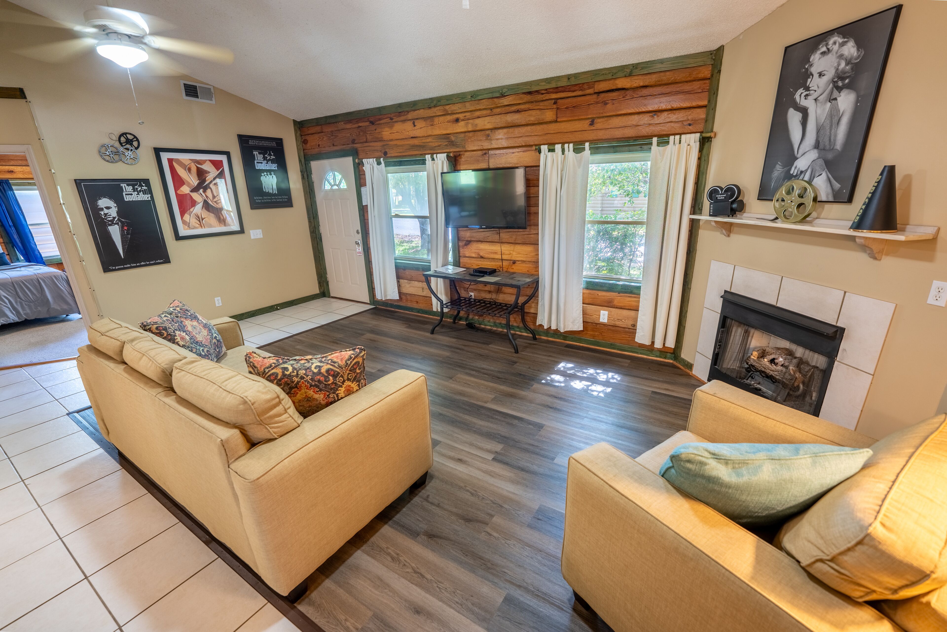 Family Cabin, Multiple Beds, Accessible Bathtub, Pets Allowed | Living area | 30-inch flat-screen TV with cable channels