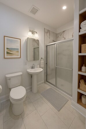 Hair dryer, towels, soap, toilet paper