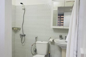 Dutxa, tovalloles, sabó i paper higiènic 