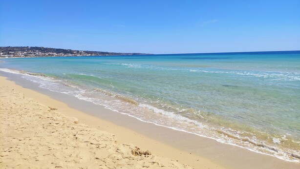 A beach with clear water and a sandy shore. - Relax in Leuca - Terrace with Panoramic Sea View - Casa Michele (Santa Maria di Leuca)