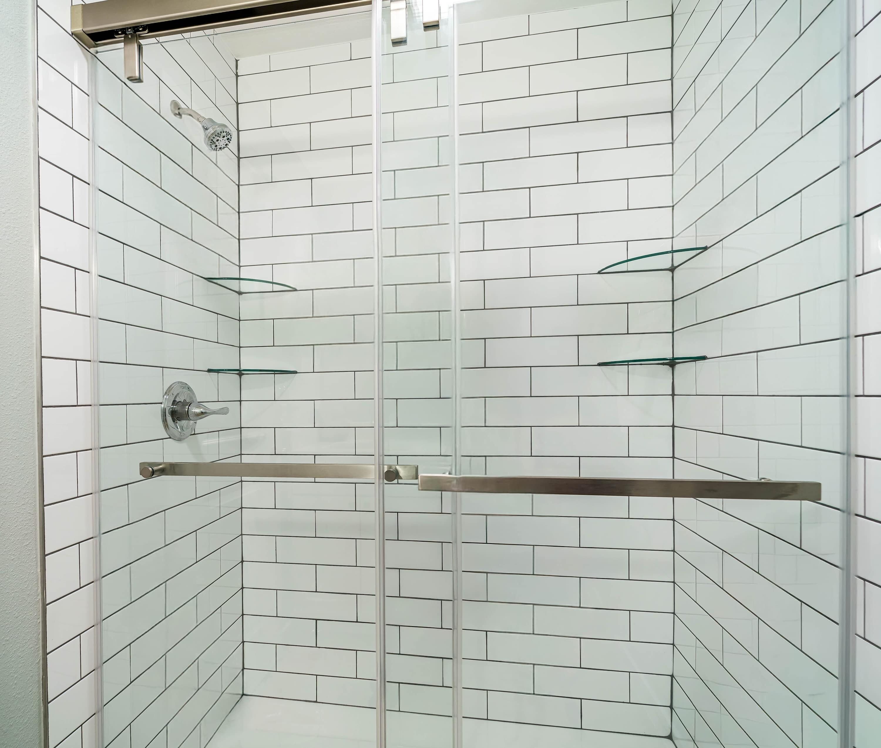 Shower, hair dryer, towels, shampoo