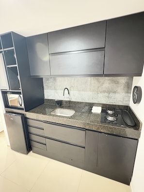 Mini-fridge, microwave, stovetop, toaster