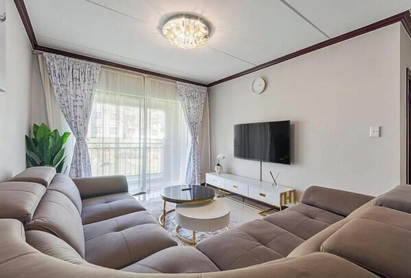 Living area - Gem in Fourways Modern 2-Bed Apartment (Randburg)