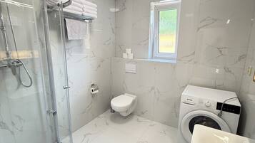 Hair dryer, towels, soap, toilet paper