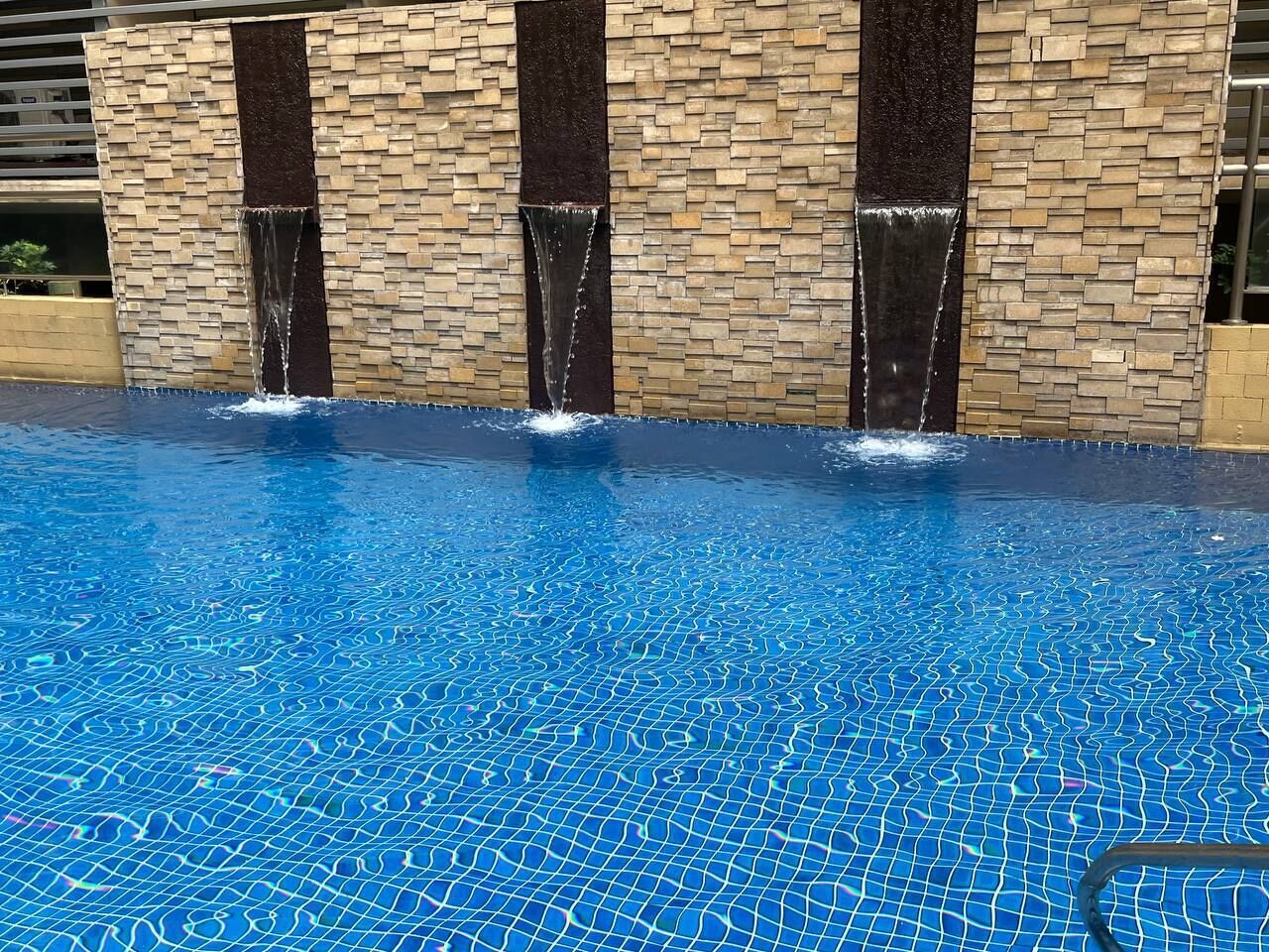 Outdoor pool, open 9:00 AM to 8:00 PM, sun loungers