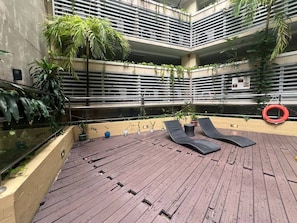 Outdoor pool, open 9:00 AM to 8:00 PM, sun loungers