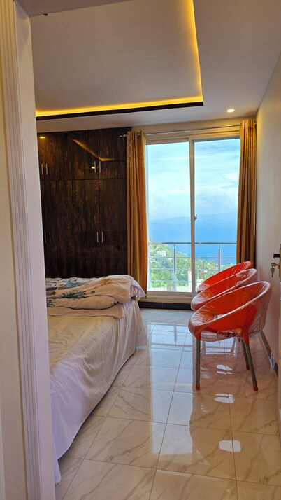 Bhurban Nights - High Floor and huge glass windows with stunning views across