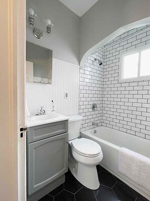 Hair dryer, towels, soap, toilet paper