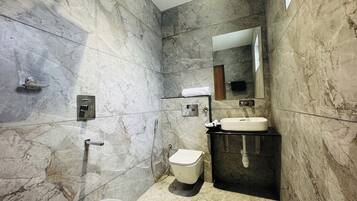 Shower, free toiletries, towels, soap