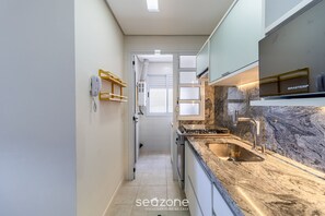 Basic Apartment | Private kitchen | Cookware/dishes/utensils - Foot in the Sand Condominium With Pool in Florianopolis - EAR (Florianópolis)