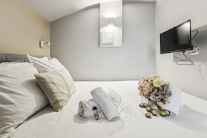 1 bedroom, desk, iron/ironing board, travel cot