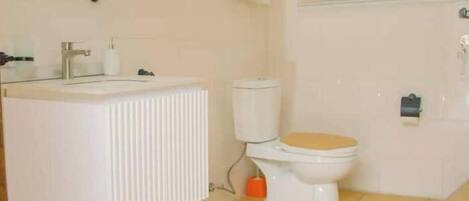 Hair dryer, towels, soap, toilet paper