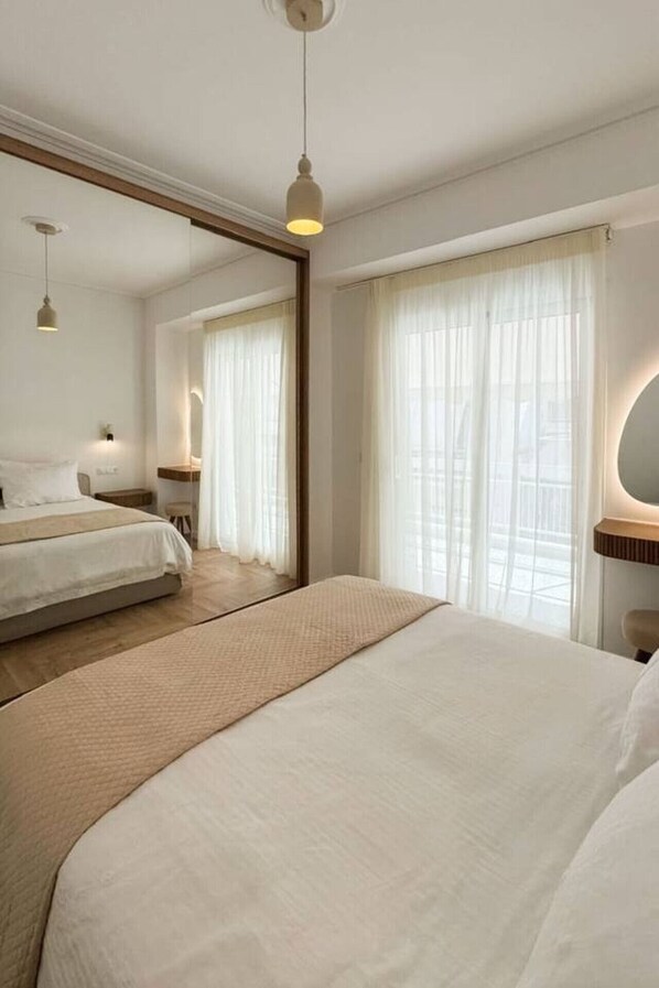 1 bedroom, desk, iron/ironing board, travel crib