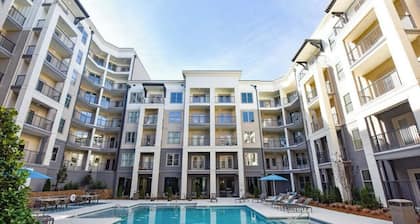 Feel at home in our 2 Bed 2 Bathroom, pool view, game room, palace in Atlanta.