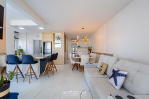 Basic Apartment | Living area | 32-inch Smart TV with digital channels